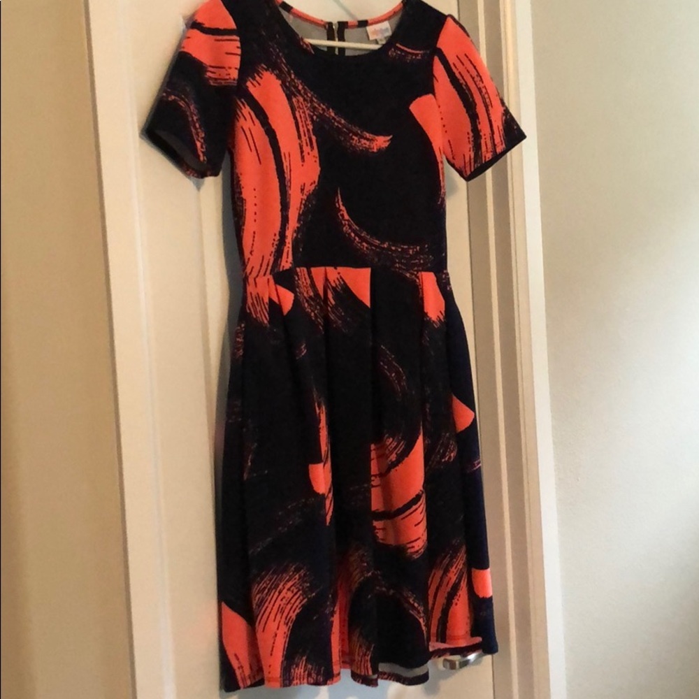 Navy/peach lularoe dress. Zip up with pleats.